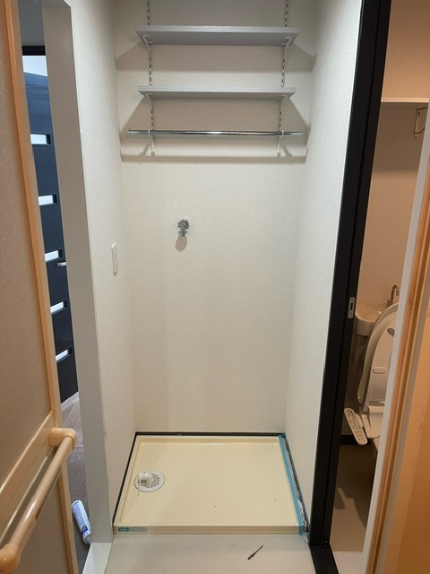 ロイヤルコート102洗濯場施工後